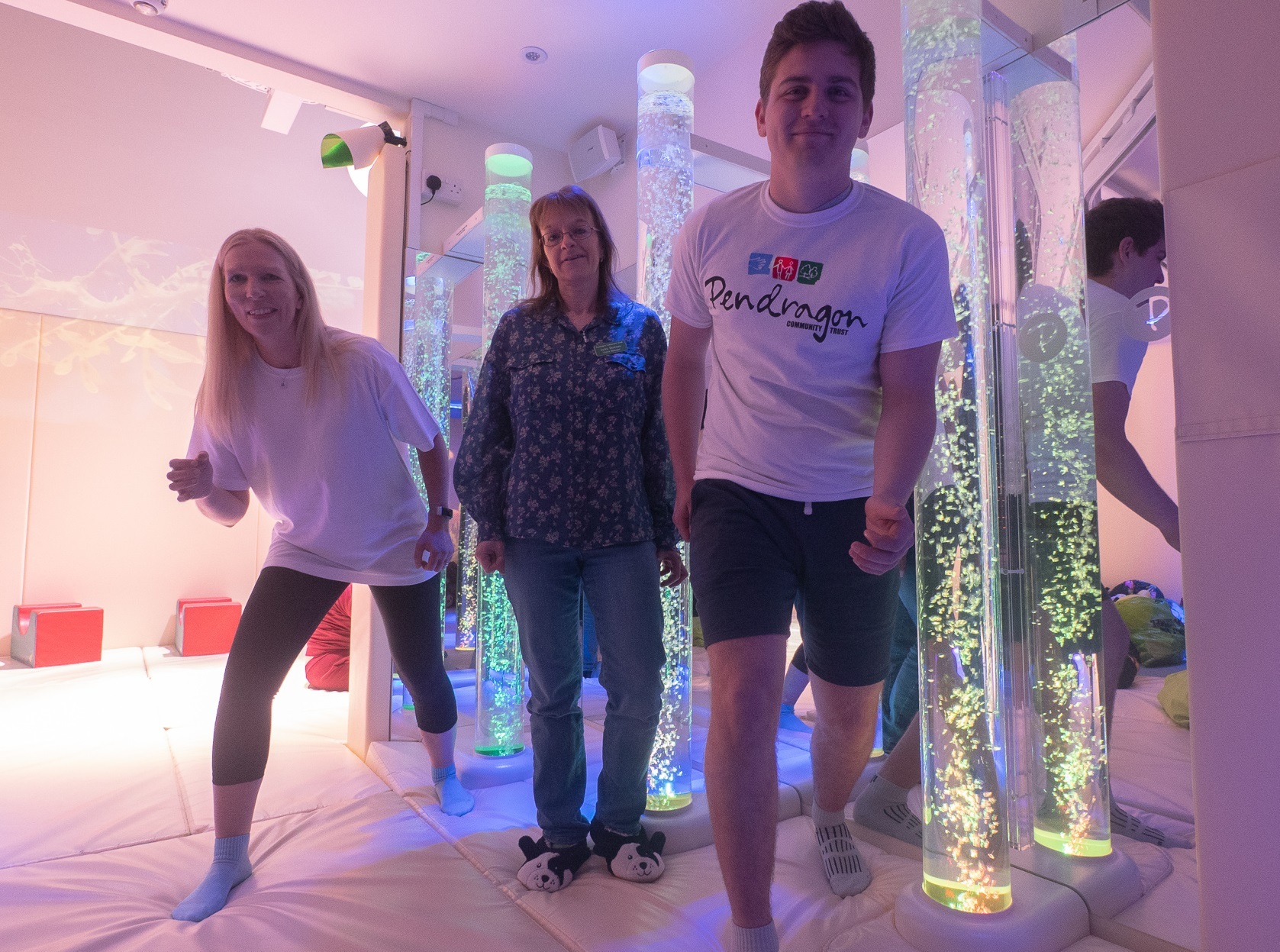 Sally Bowen and Oliver Walters of Simon Bailes Peugeot with Jules Downes (centre) at the Pendragon Multi-Sensory Centre in Northallerton