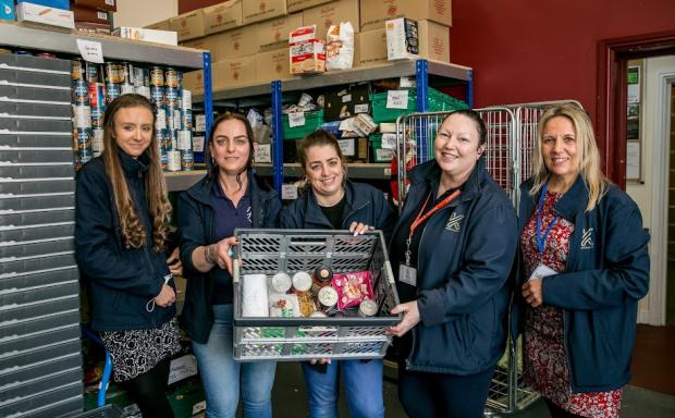 The Northern Echo: A team of volunteers is responsible for packing food parcels and making sure those most in need get their essentials. Picture: SARAH CALDECOTT