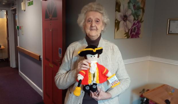 The Northern Echo: Hazelgrove Court Care Home resident Joyce Tibbett, 88, with one of the dolls she helped created for the display at Emmanuel Church
