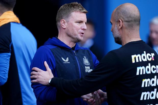 Eddie Howe shakes hands with Pep Guardiola ahead of Newcastle's 5-0 defeat to Manchester City at the Etihad. Picture: MARTIN RICKETTS/PA WIRE