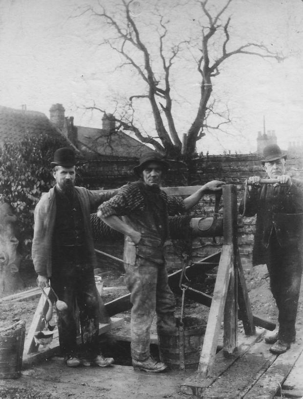 The Northern Echo: The Oliver family tend a well somewhere in Hurworth - do you recognise where it might be?