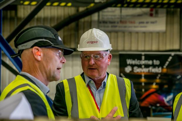 The Northern Echo: Alex Harper Operations Director at Severfield and Arqiva Chief Exec Paul Donovan at the Severfield site where the new Bilsdale mast is being made Picture: SARAH CALDECOTT