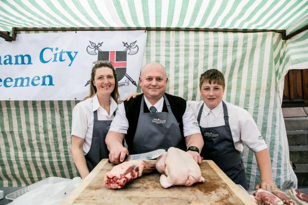 The Northern Echo: Center Butcher Neville Reed with Rachael and Tom Jewson from Knitsley Farm Shop Picture: SARAH CALDECOTT