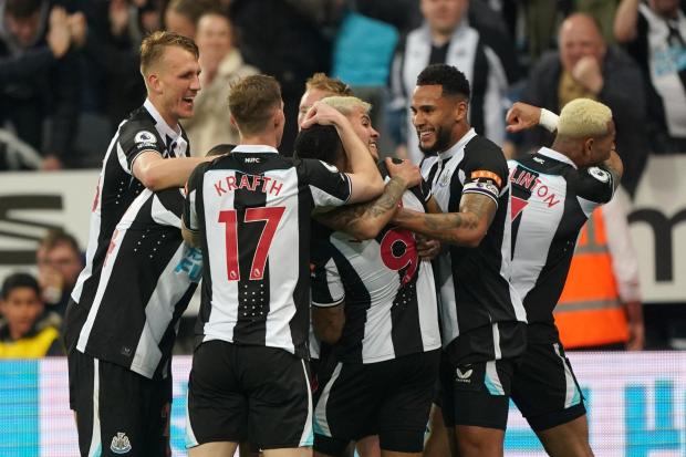 Newcastle United's players celebrate their first goal against Arsenal at St James' Park. Pictures: OWEN HUMPHREYS/PA
