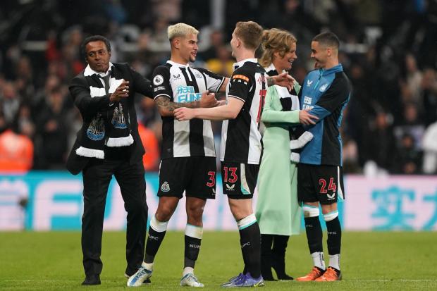 Matt Targett celebrates with Newcastle team-mate Bruno Guimaraes in the wake of his side's victory over Arsenal