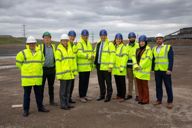 Ben Houchen, Tees Valley Mayor (centre right) shaking hands with Saren Jacobsen, Dimeta CEO and Circular Fuels Limited Director (centre left) at the Teesworks site with Matt Johnson, Teesworks Development Director (far right) and other guests