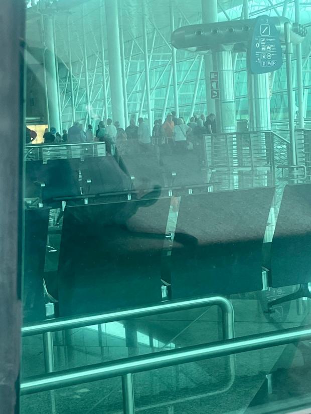 The Northern Echo: Passengers get restless in Porto Airport. Picture: AARON SCOTT.