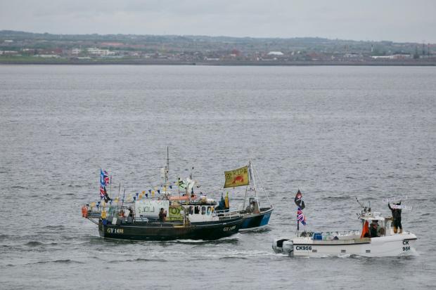 The Northern Echo: Dozens of fishing boats took part in the protest at the mouth of the River Tees. Picture: SARAH CALDECOTT