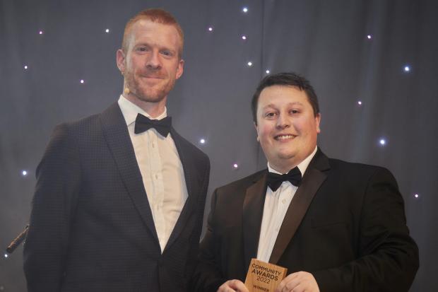 Adam Pearce being presented with the Rising Star award