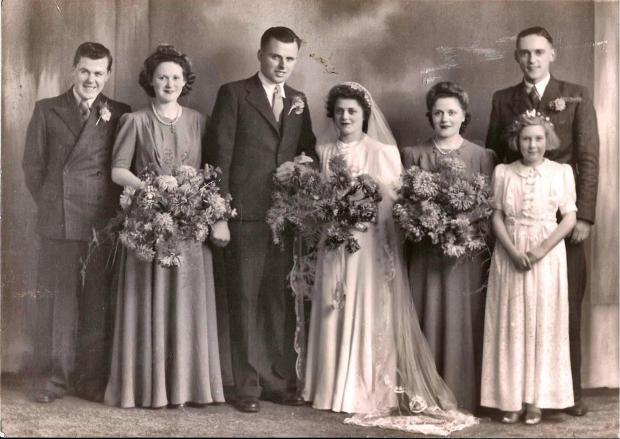 The Northern Echo: Ena getting married to her husband, Jim Russ, with her identical sister Gwen the bridesmaid to her left. Bert, the third of the Thurgood triplets, is on the right