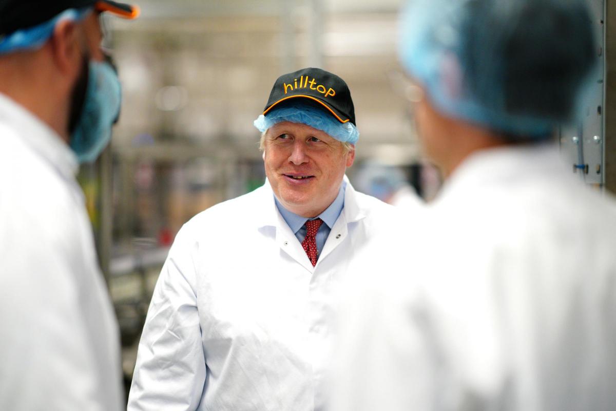 Prime Minister Boris Johnson during a visit to Hilltop Honey in Newtown, Powys, Wales. Picture date: Friday May 20, 2022. Photo: Ben Birchall/PA Wire