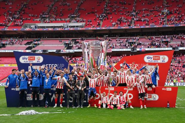 Sunderland's players celebrate after their play-off final win