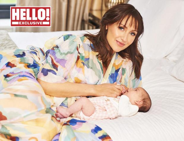 The Northern Echo: Catherine Tyldesley with her baby daughter Iris as they appear in this week's edition of the magazine. Credit: Hello! Magazine/PA