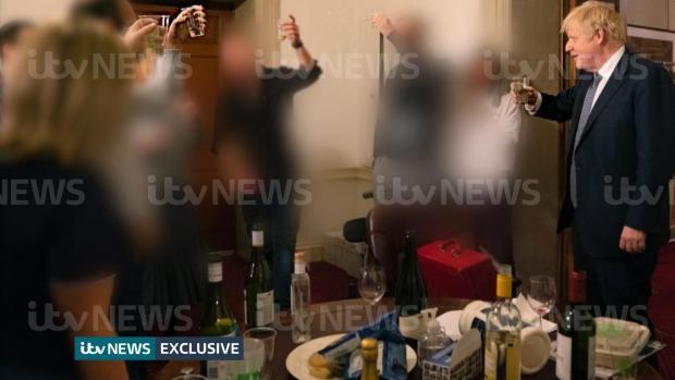 The Northern Echo: Boris Johnson with a drink in his hand during a gathering. Picture: ITV NEWS