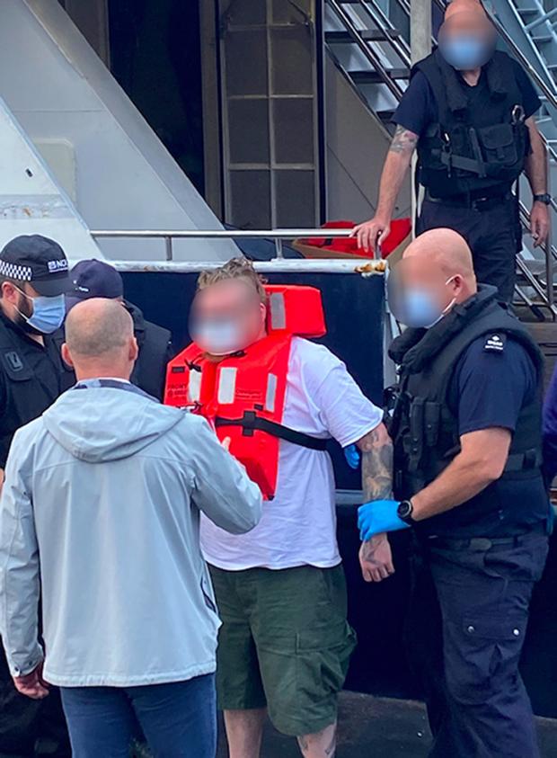 The Northern Echo: A man being taken off the Jamaican-flagged yacht Kahu at an undisclosed location