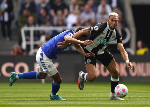 The Northern Echo: Leicester City's James Justin (left) and Newcastle United's Joelinton battle for the ball during the Premier League match at St. James' Park, Newcastle upon Tyne. Picture date: Sunday April 17, 2022.