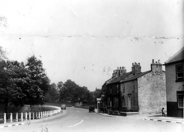 The Northern Echo: Tees View, Hurworth Place, in May 1939 with a dark vehicle parked outside what is now Croft News but then the street was full of retail establishments: the signs indicate two cafes and a grocer's shop