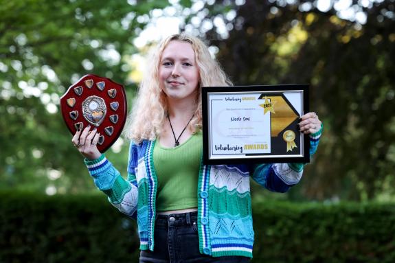 The Northern Echo: Year 12 student Nicole Seal, who was named ‘QE Volunteer of the Year’ with her award. Picture: QUEEN ELIZABETH SIXTH FORM COLLEGE The Northern Echo: Year 12 student Nicole Seal, who was named ‘QE Volunteer of the Year’ with her award. Picture: QUEEN ELIZABETH SIXTH FORM COLLEGE