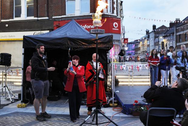 The Northern Echo: The lighting of the jubilee beacon in Stockton town centre by the Deputy Lord Lieutenant of County Durham and the Mayor Cllr Ross Patterson. Pictures: STUART BOULTON