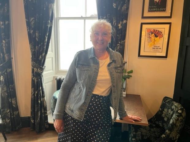The Northern Echo: Deborah Jemson at the spot where her desk used to be and where the photo below was taken before her retirement Picture: ALEXA FOX