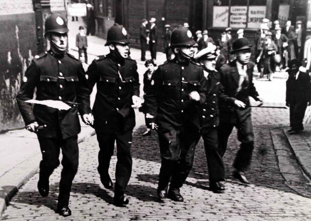 The Northern Echo: South Shields police, with their truncheons drawn, go searching for rioters on August 3, 1930, in the Mill Dam area of the town