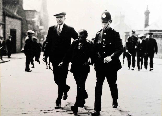 The Northern Echo: South Shields police arrest an Arabic man during the 1930 riot