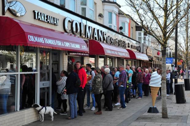 The Northern Echo: Queues outside Colmans in South Shields. Picture: NORTHERN ECHO