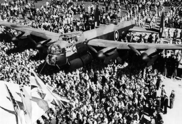 The Northern Echo: Crowds surround KB-700, the "Ruhr Express", as it is rolled out of the factory in Canada on August 1, 1943, the first of 430 Lancasters to be made in Canada