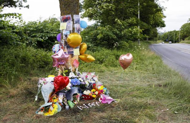 The Northern Echo: Tributes left at the scene of the crash Picture: STUART BOULTON