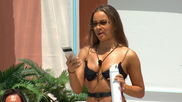 The Northern Echo: Danica gets a text as Love Island continues tonight at 9pm on ITV2 and ITV Hub. Episodes are available the following morning on BritBox. Credit: ITV