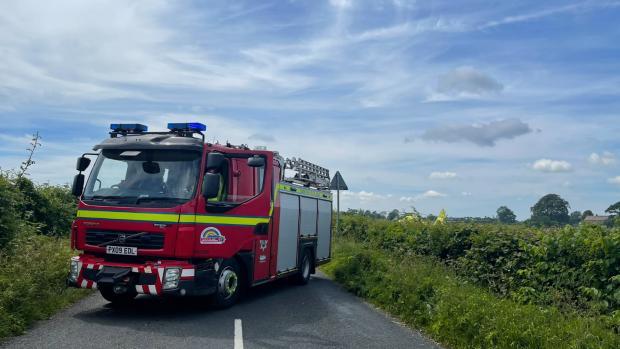 The Northern Echo: A fire engine blocks access to the crash site Picture: Tom Beresford