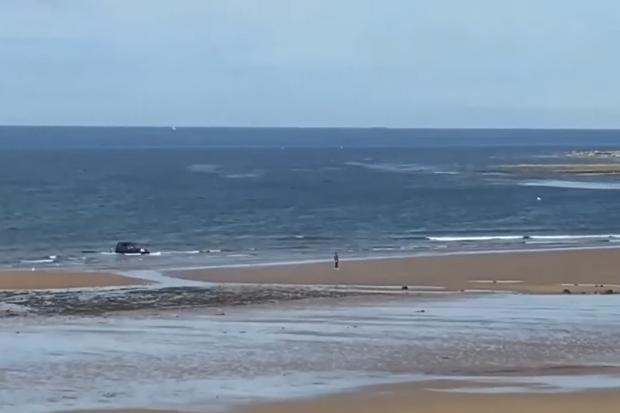 The unfortunate drivers, who had presumably planned to enjoy a nice evening at Saltburn beachfront could be seen frantically running towards their car in video footage shared online. Picture: INCIDENTS ON TEESSIDE & COUNTY DURHAM