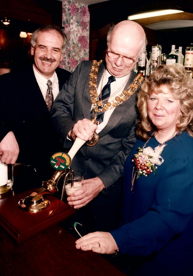 The Northern Echo: Lynn and Kenny Beagle, with mayor Eric Roberts, celebrate the reopening of the Cricketers in March 1991 after they had doubled the size of the pub that was once Darlington's narrowest
