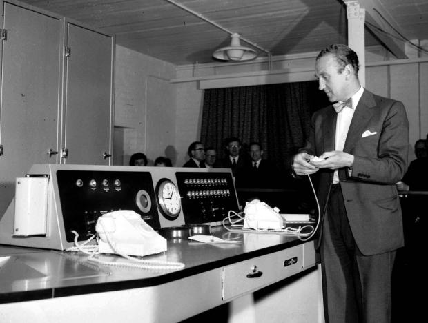 The Northern Echo: Ernest Marples, the Postmaster-General, pressing a button to start up ERNIE (the Electronic Random Number Indicating Equipment) for the first Premium Savings Bonds draw, at Lytham St Annes, Lancashire, on June 1, 1957