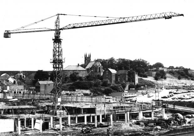 The Northern Echo: Looking at Framwellgate and St Godric's church from the Milburngate bridge in July 1974 as the shopping centre takes shape