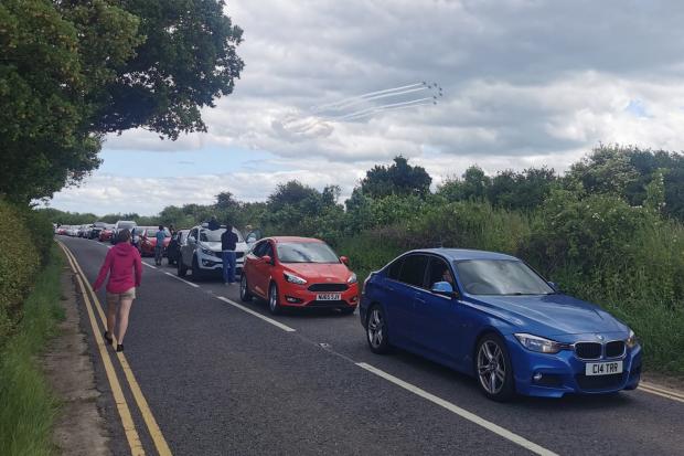 Thousands going to the airshow were forced to watch the displays from the roadside. Picture: CRAIG STODDART