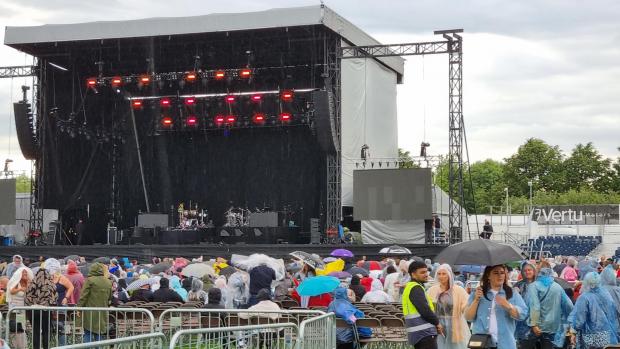 The Northern Echo: Fans were not put off by the rain as a DJ took to the stage. Picture: DANIEL HORDON