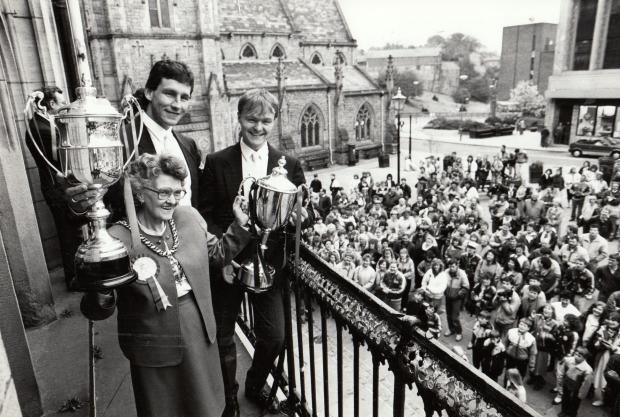 The Northern Echo: Paul Smith, right, with Mike O'Connor and Councillor Ivy Humphries parading their trophies on the balcony of Durham Town Hall in 1988