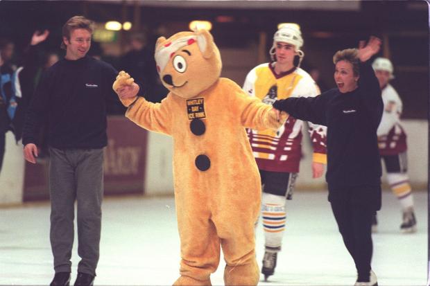 Torvill and Dean plus Pudsey Bear on the Whitley Bay ice in 1997