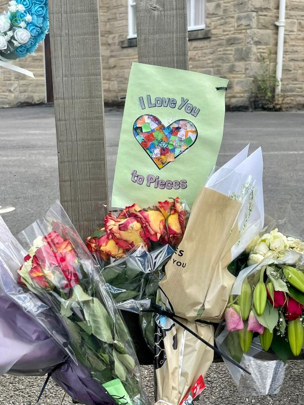 The Northern Echo: A touching tribute is left at the Esh Winning crash site. Picture: SARAH CALDECOTT