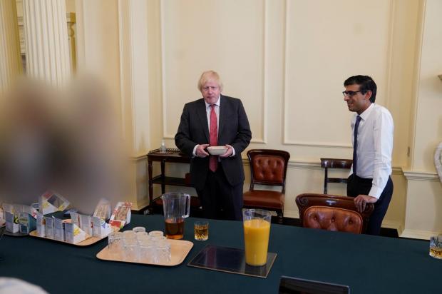 The Northern Echo: EDITORS NOTE IMAGE REDACTED AT SOURCE Handout photo dated 19/06/20 issued by the Cabinet Office showing Prime Minister Boris Johnson (left) and Chancellor of the Exchequer Rishi Sunak at a gathering in the Cabinet Room in 10 Downing Street on his