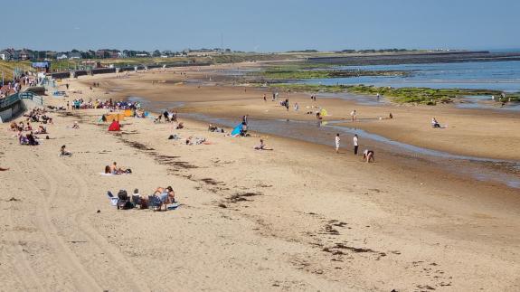 The Northern Echo: Hundreds flocked to Whitley Bay beach on Monday during the heatwave. Picture: DANIEL HORDON The Northern Echo: Hundreds flocked to Whitley Bay beach on Monday during the heatwave. Picture: DANIEL HORDON