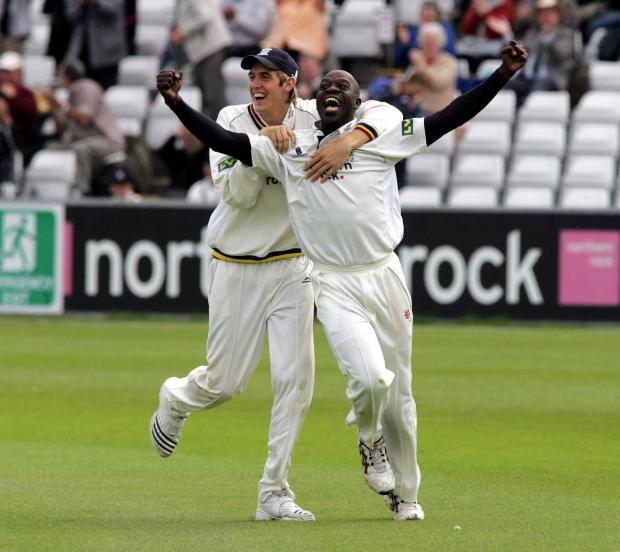 The Northern Echo: Durham v Hampshire at Riverside , Chester le street - Otis Gibson celebrates taking 10 wickets.  Also pictured is Ben Harmison