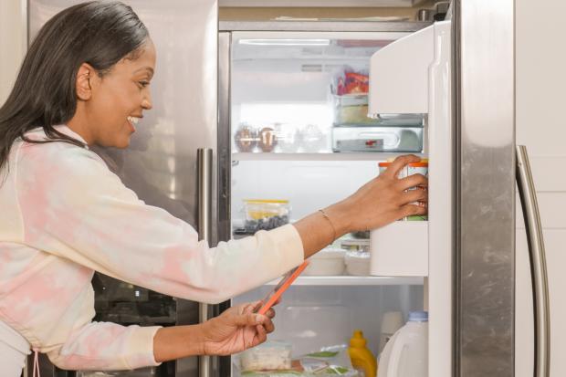 The Northern Echo: A woman looking in the fridge. Credit: Canva