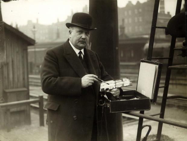 The Northern Echo: JE Hodgkin painting a railway engine at King's Cross station in May 1927. This was a publicity photo for an exhibition he was holding in Liverpool. Picture courtesy of the Darlington Centre for Local Studies