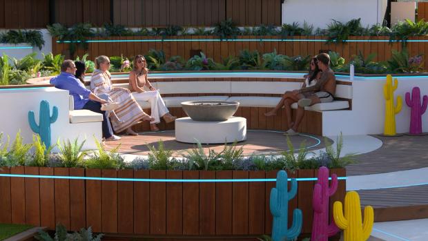 The Northern Echo: Gemma and Luca at the fire pit with their families. Love Island continues tonight at 9pm on ITV2 and ITV Hub. Episodes are available the following morning on BritBox. Credit: ITV
