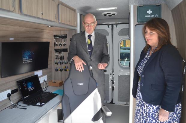 The Northern Echo: Detective Superintendent Jon Naughton gives Police, Fire and Crime Commissioner Zoë Metcalfe a tour of the mobile digital forensic laboratory Picture: NYP