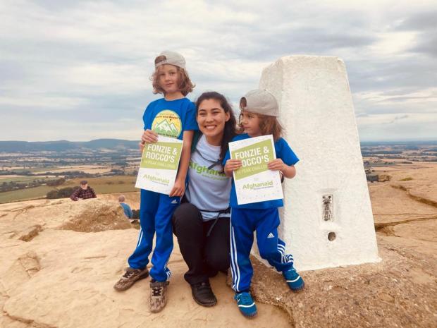 The Northern Echo: Freshta Ibrahimi joined Fonzie, six and Rocco, three, on their final climb up Roseberry Topping Picture: Emily Smith