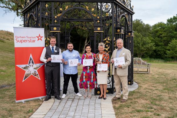 The Northern Echo: Connor Turnbull, Winner of Durham Tourism Superstar 2022 (second from left) with the other finalists, from left: Kevin Jackson, a porter at Seaham Hall Hotel; Maria McArdle, manager of Killhope Lead Mining Museum; Beryl Anderson, visitor experience assistant at Locomotion; and Robert Brown, a volunteer at Ushaw Historic House, Chapels and Gardens. Picture: Visit County Durham 