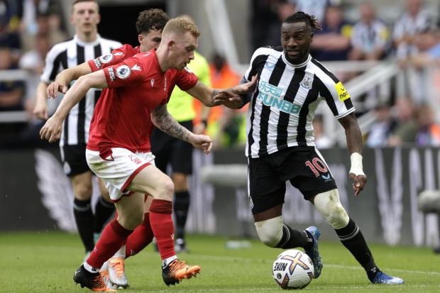Allan Saint-Maximin dribbles past Lewis O'Brien during Newcastle's 2-0 win over Nottingham Forest (Picture: Owen Humphreys/PA Wire)